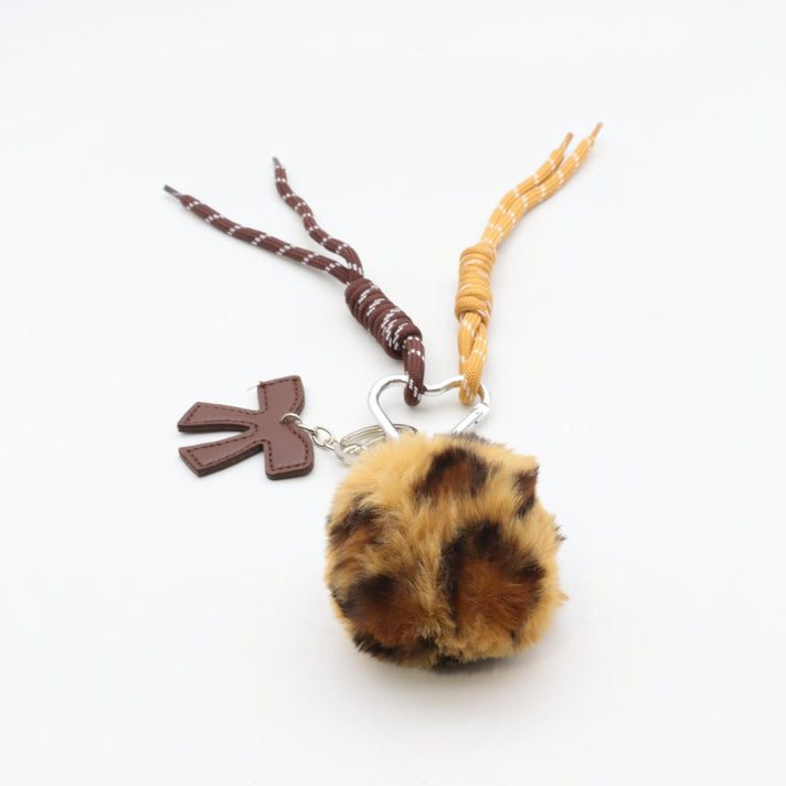 Flora&Co Tassenhanger 009 Pompon Camel Flora&Co Tassenhanger 009 Pompon Camel